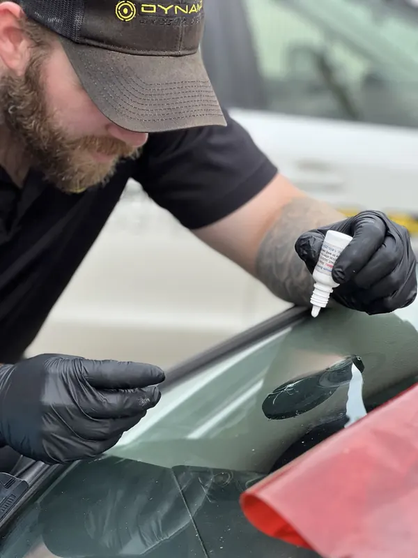 Mobile windshield chip repair being performed in Edmonton