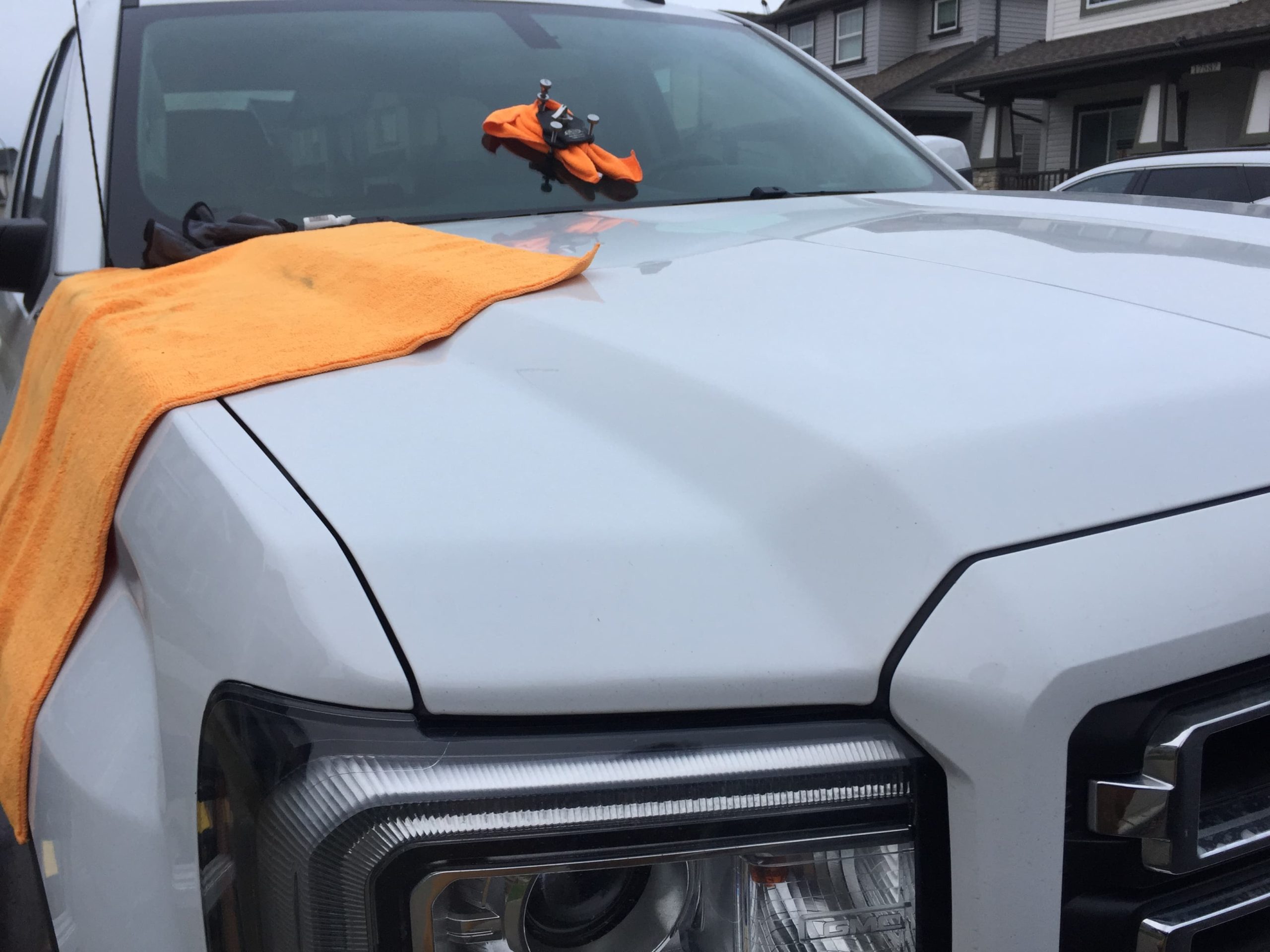 windshield chip repair on a white truck